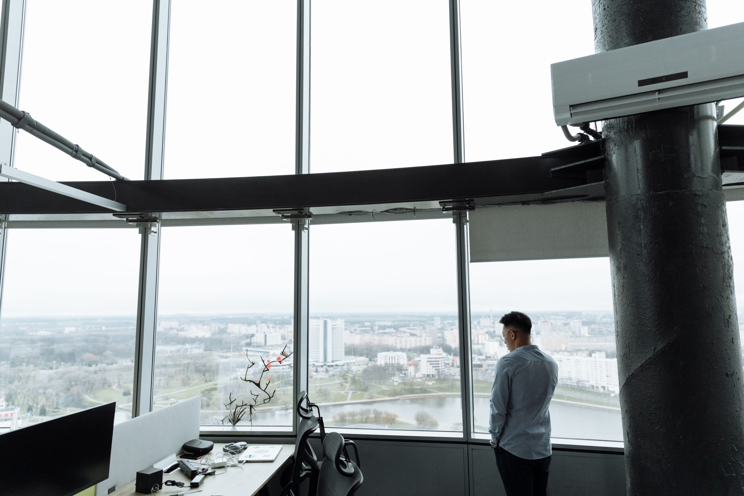 Entrepreneur looking out window